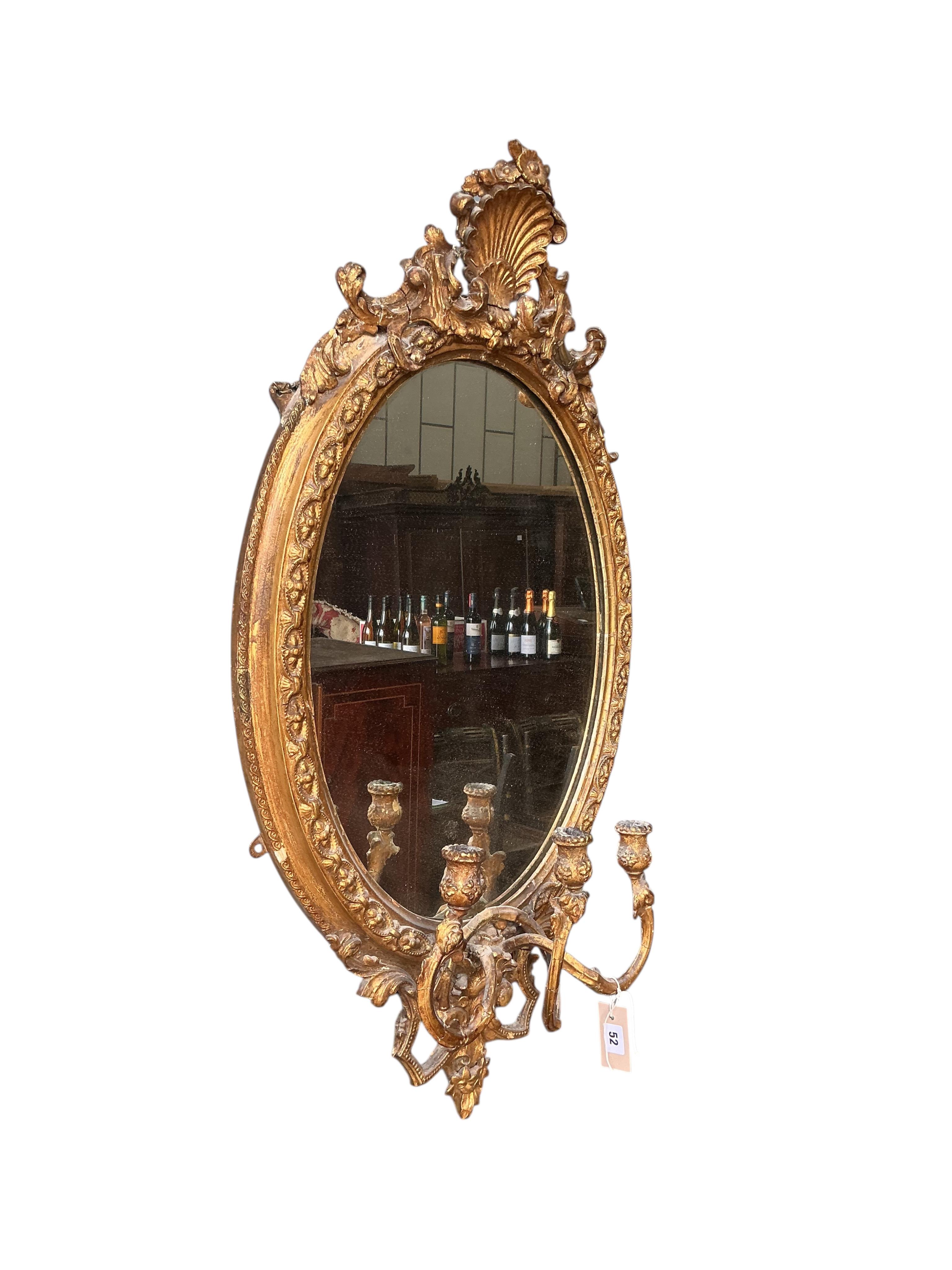 A Victorian giltwood and composition girandole wall mirror, width 56cm, height 96cm